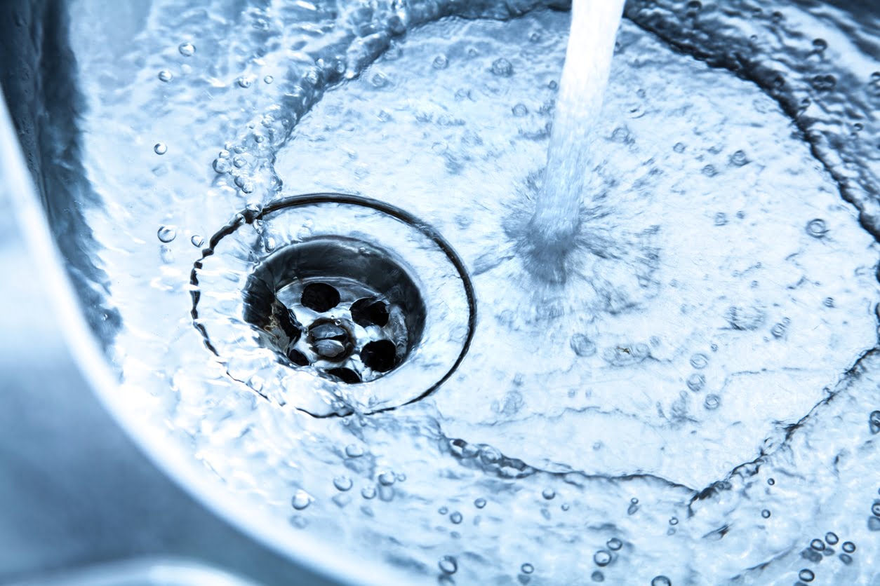 Kitchen sink with running water